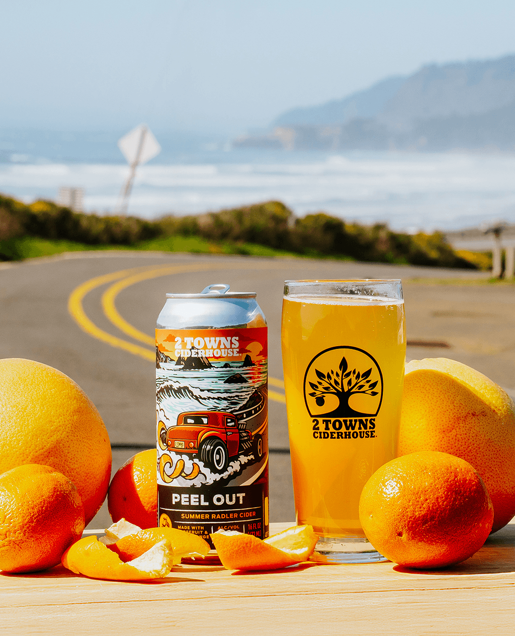 CRUISE INTO SUMMER WITH PEEL OUT, A BRIGHT GRAPEFRUIT RADLER FROM 2 TOWNS CIDERHOUSE